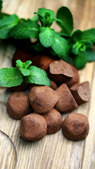 Selective focus. Fresh mint leaves and chocolate mint truffle. Mint chocolate.