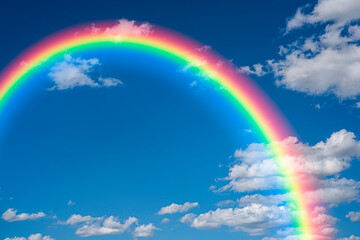 rainbow in the blue sky background