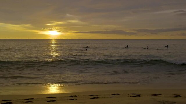 Naithon sea public beach. Phuket, Thailand, famous surf spot in Phuket, Naithon sea beach at sunset. Thailand, Phuket.