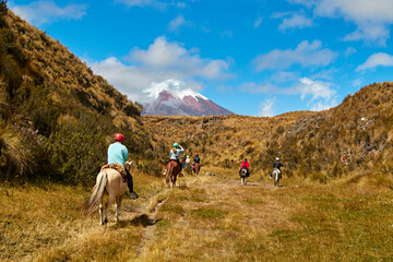 people on horseback in the landscape of the Andes, Cotopaxi - obrazy, fototapety, plakaty