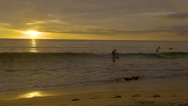 Naithon sea public beach. Phuket, Thailand, famous surf spot in Phuket, Naithon sea beach at sunset. Thailand, Phuket.