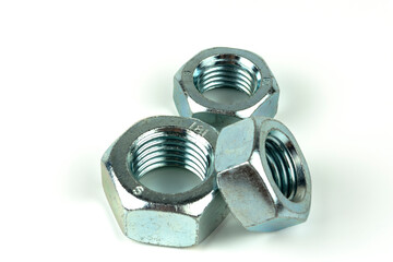 Close-up shot of plastic colored clips for the car.Abstract background. Panel plastic rivets isolated on white background. Auto plastic clasps. Insulated clip or automatic plastic clasp