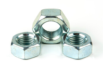 Close-up shot of plastic colored clips for the car.Abstract background. Panel plastic rivets isolated on white background. Auto plastic clasps. Insulated clip or automatic plastic clasp