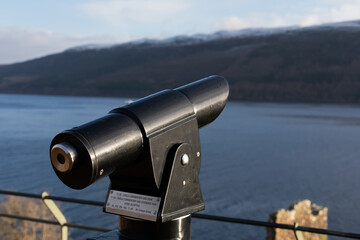Coin operated binoculars