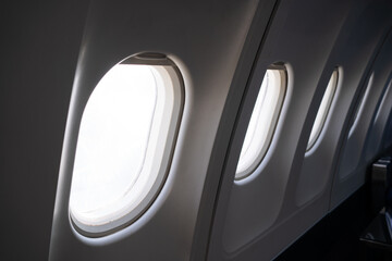 Airplane, aircraft window with white blank space.