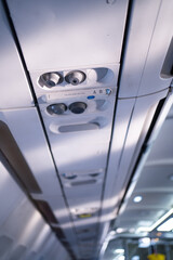 Air condition unit and lighting of aerospace on the ceiling of passenger cabin.