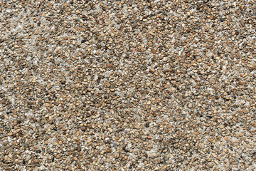 Above view of stone slab with many tiny granules. For background and textured.