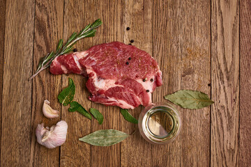 meat on a wooden table pepper ingredients cooking protein