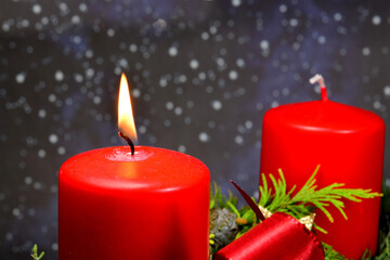 advent wreath with burning candle