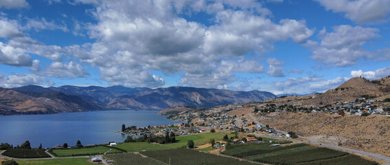 Lake Chelan and surrounding hills and countryside of orchards and residential areas as seen from...
