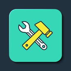 Filled outline Crossed hammer and wrench spanner icon isolated on blue background. Hardware tools. Turquoise square button. Vector