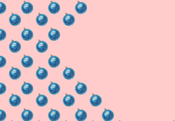 Background, pattern of blue Christmas ball on pink background