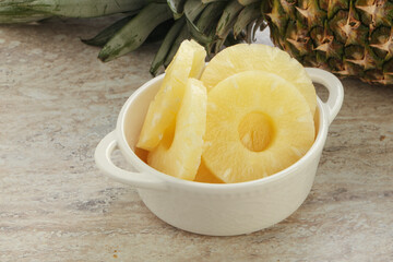 Marinated pineapple rings in the bowl