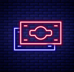 Glowing neon line Stacks paper money cash icon isolated on brick wall background. Money banknotes stacks. Bill currency. Colorful outline concept. Vector