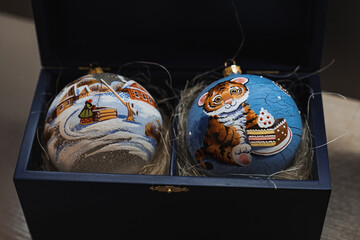 Colorful balls with tiger  Close-up Christmas decorations. Merry Christmas and Happy New Year 2022 