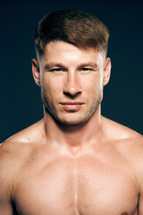 athletic male topless workout muscle bodybuilder dark background