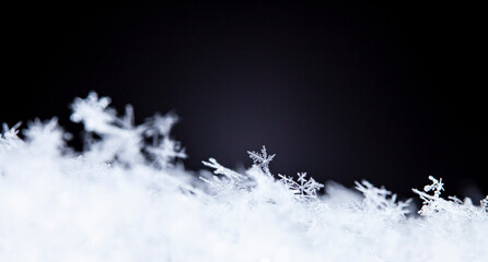 Beautiful ice crystal lies in the snow, Christmas And Winter Background