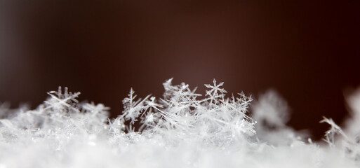 Beautiful ice crystal lies in the snow, Christmas And Winter Background