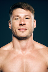 Fototapeta premium athletic male topless workout muscle bodybuilder dark background
