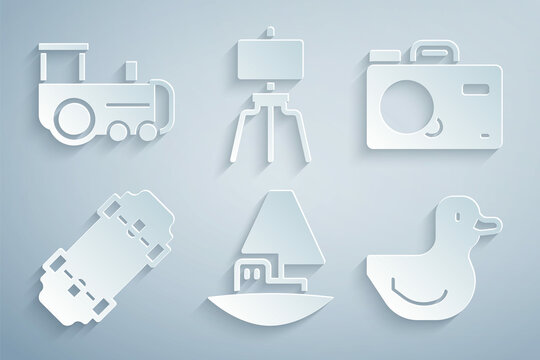 Set Toy boat, Photo camera, Skateboard, Rubber duck, Wood easel and train icon. Vector