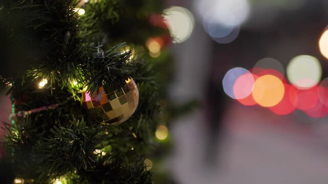 Christmas ball on pine tree branch blurred bokeh night scene merry x ams happy new year concept