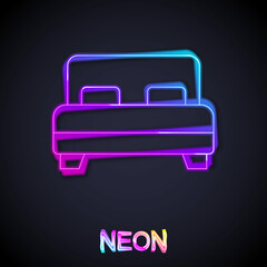 Glowing neon line Big bed for two or one person icon isolated on black background. Vector