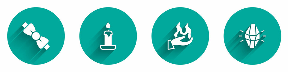 Set Bow tie, Burning candle, Hand holding fire and Magic stone icon with long shadow. Vector