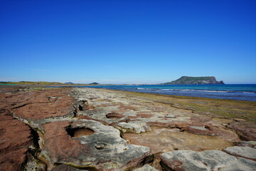 a shoaling beach with clear water