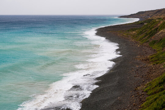 The coast of Samandag, where the Amanos mountains meet the Mediterranean Sea. The shores of Turkey's Hatay city, Samandag district. The impressive colors of the Mediterranean from green to blue.