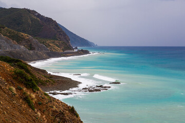 The coast of Samandag, where the Amanos mountains meet the Mediterranean Sea. The shores of Turkey's Hatay city, Samandag district. The impressive colors of the Mediterranean from green to blue. © CONQUEROR