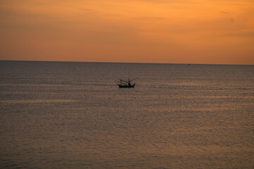Naklejka premium Wallpaper blurred nature of the twilight light in the evening by the large water basin surrounded by big trees, the integrity of the forest