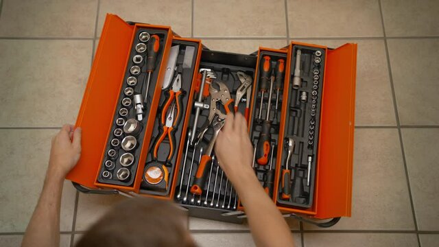 Open box with plumbing tools