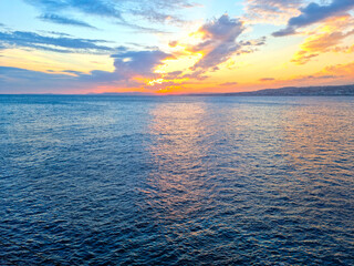 Sunset and clouds over the ocean