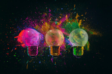 explosion of 3 colored light bulbs
