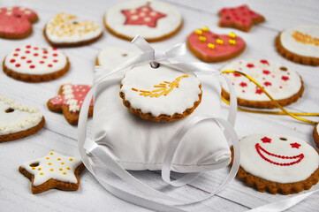 Colorful Icing cookies. Christmas homemade cookies on wooden table.