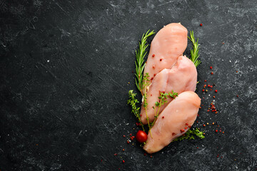 Meat. Raw chicken fillet with spices. Top view. Rustic style. - obrazy, fototapety, plakaty