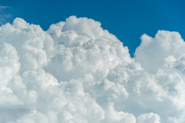 Naklejka na ściany i meble Cummulus clouds background blue sky