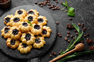 Sweet cookies with cherry filling. Sweet pastries and dessert. Top view.