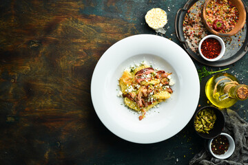 Potato gnocchi with bacon and cheese. Restaurant menu. Top view.