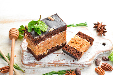 Peanut chocolate cake. Dessert. On a black background. Top view.