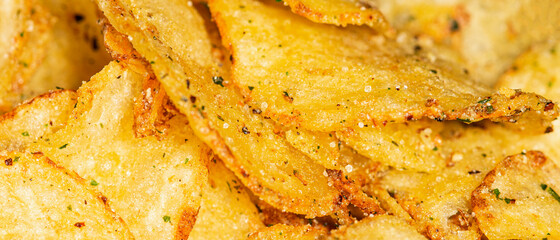 Natural fat potato chips with salt, black pepper, herbs and vegetable oil
