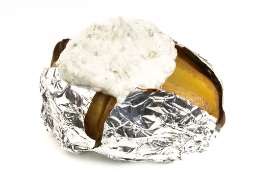 Baked Potato with Sour Creme isolated on white Background