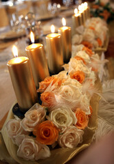 Candle lights arranged on a table