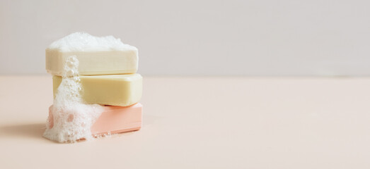 A bar of organic handmade soap with large bubbles of foam. Health beauty natural products concept. Organic cosmetics. 