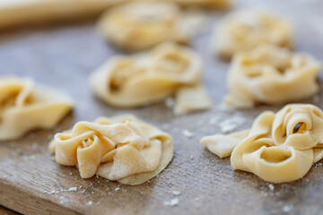 Fresh homemade pasta on board