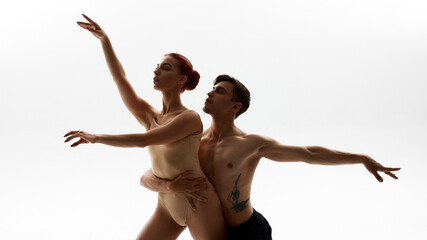 European dance couple dancing ballet in studio