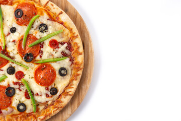 Traditional supreme pizza isolated on white background. Top view. Copy space	