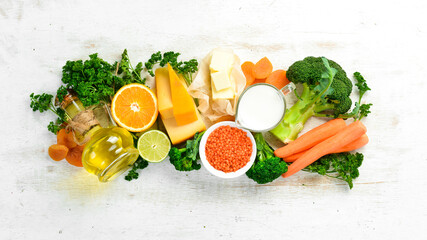 Set of vegetables, fruits and organic foods rich in vitamin A. Top view. Free space for your text.