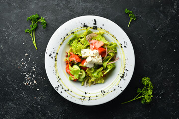 Vegetable salad with feta cheese. Vegan menu. Top view. Rustic style.