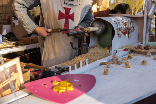 Vic, Barcelona, Spain: 12.08.2021; The woodworker on the jod on Christmas market in Vic